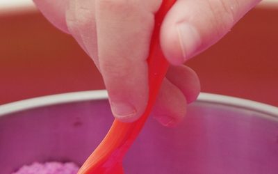 Recall issued and schools closed over asbestos risk in coloured sand